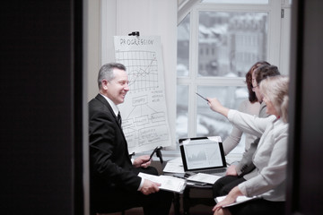 financial partners discussing a new commercial contract