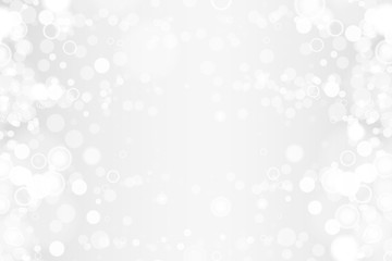 Silver and white bokeh lights defocused. Abstract background. Elegant, shiny, blurred light background. Magic christmas background. EPS 10.