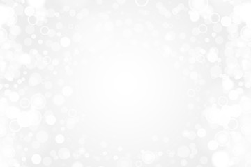 Silver and white bokeh lights defocused. Abstract background. Elegant, shiny, blurred light background. Magic christmas background. EPS 10.