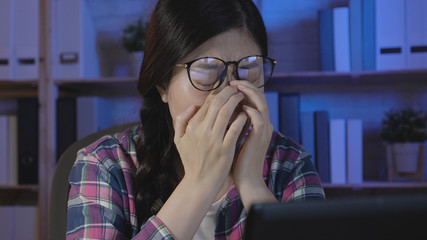 young girl closing eye feeling uncomfortable