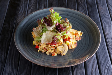 Scrambled eggs with mushrooms and romaine, batavia, lettuce, salad