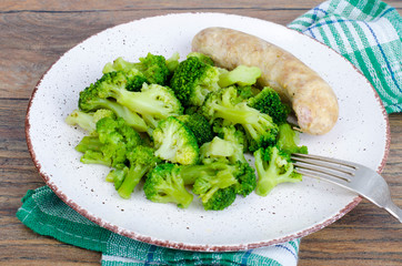 Boiled broccoli with sausage