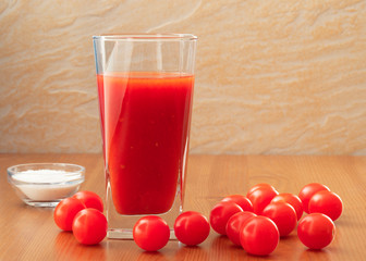 A glass of tomato juice homemade on the table