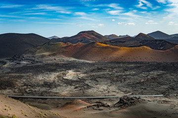 Amazing  landscape of Timanfaya National Park on the volcanic island of Lanzarote (Canary Islands) in Spain.