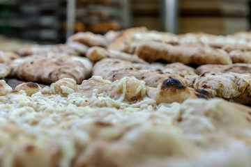 Arab cheese flakes on pita bread