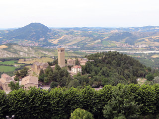 Fototapeta na wymiar View from the fortress wall to the small town of San Leo, Italy, Europe.This settlement is over 1600 years old.