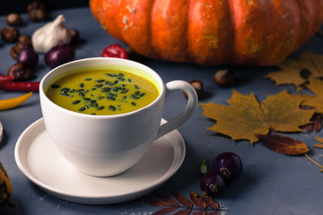 Pumpkin asian coconat cream soup. Autumn hot food