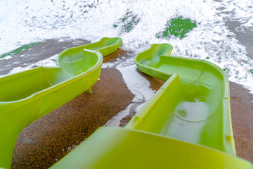 Double slides on a playground in Utah in winter