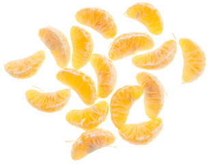 Juicy slices of mandarin isolated on white background