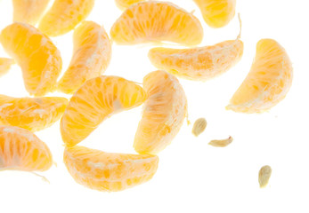 Seeds in tangerines on a white background