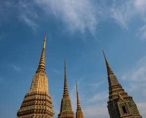 Fototapeta premium Grand Palace Bangkok Decorative Pagodas against blue sky