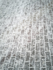 Footprints in the snow as an abstract background