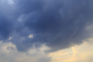 Obraz premium Clouds after rain before sunset as a background