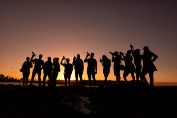 photographers at the sunset, backlighting