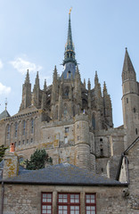 Fototapeta premium Ancient buildings of the old town on the famous Mont Saint Michel island in France