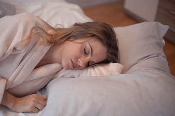 Obraz na płótnie Canvas Woman asleep in bed.