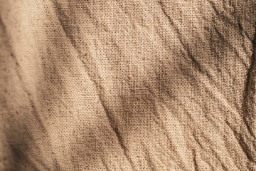 brown  linen canvas. The background image,  creases texture background