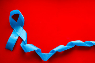 World cancer day. Bright colored ribbon - symbol of  fight against cancer and hope for recovery from cancer. International Agency for research on cancer