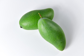 Green mango and leaf on whitebackground.