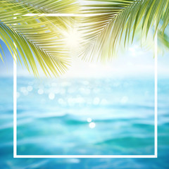 Fototapeta na wymiar Abstract summer defocused background with frame, nature of tropical, rays of sun light. Beautiful sun glare sparkle on sea water and palm leaves, blue sky. Copy space, summer vacation concept.