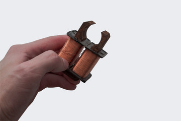 Copper coil on the hand.