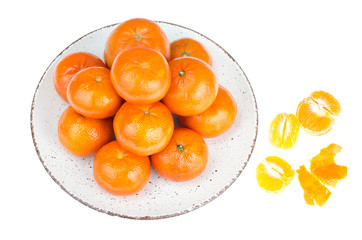 Sweet ripe tangerines on plate