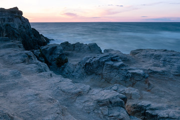French landscape - Bretagne. A beautiful coast with rocks at sunset.