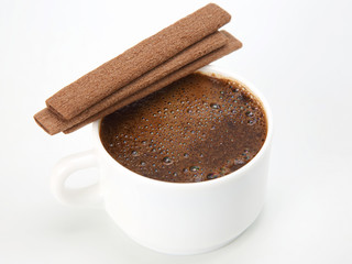 coffee in white Cup on white background with cookies