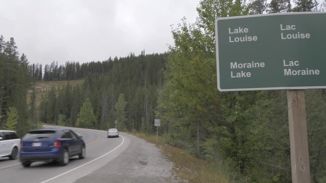 Road and sign posts to Lake Moraine and Lake Louise, Banff National Park, Alberta, Canada, North America