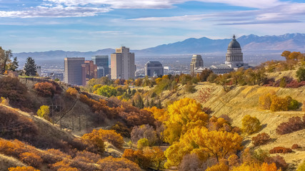 Fall colors on a hill overlooking Salt Lake City
