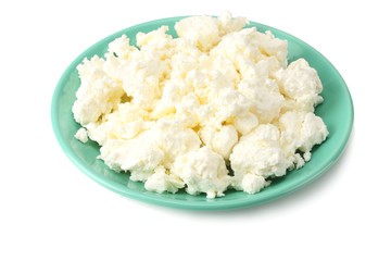 cottage cheese in blue bowl isolated on white background