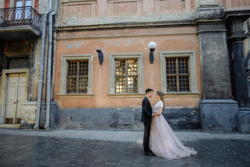 Lovely couple hugging in gorode. Europe.