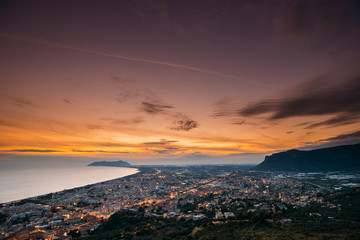 Fototapeta premium Terracina, Italy. Top View Skyline Cityscape City In Evening Sunset. City Illuminations