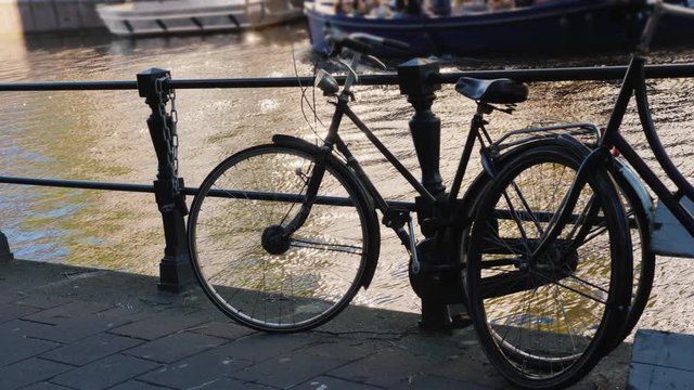 Bicycles at the canal railing in Amsterdam. The most popular transport in the city
