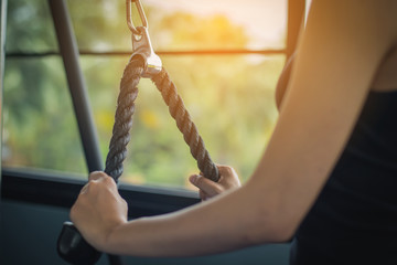 fitness woman doing exercises and warm up at gym ; healthy lifestyle