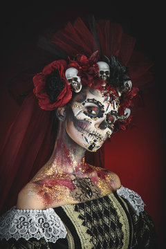 Young girl in the image of Santa Muerte