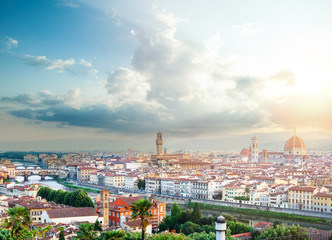 Fototapeta na wymiar Florence cityscape. Skyline of Florence Italy with Duomo, Basilica di Santa Maria del Fiore, the bridges and cloudy sky. Firenze landmarks