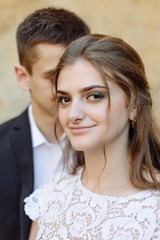 Beautiful Bride Portrait wedding makeup hairstyle, gorgeous young woman in white dress at home. series.