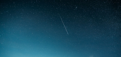 Night Starry Sky With Glowing Stars And Meteoric Track Trail. Meteorite Trail In Starry Sky...