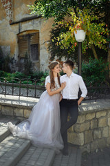 Affectionate young couple hugging looking at each other