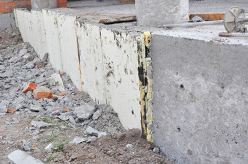 House concrete foundation insulation with stryfoam boards.