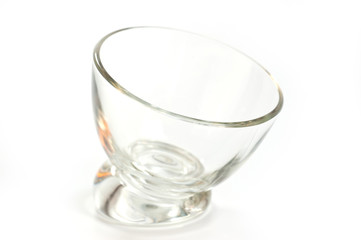 Cup vase with a slope of clear glass on a white background