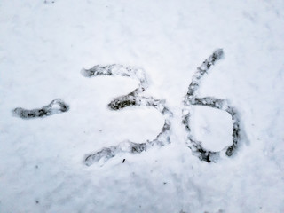 Temperature of -36 written in the freshly fallen snow