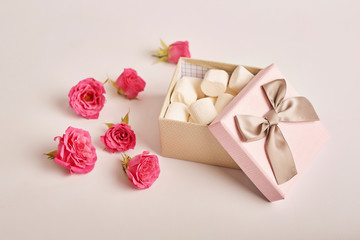 gift box with flowers on a white background to Valentine's Day or Mother's Day