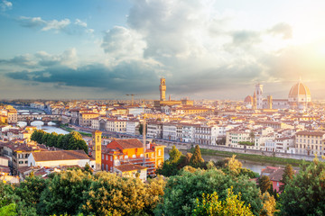 Fototapeta na wymiar Firenze panorama. View of Florence Italy with Florence Duomo, Basilica di Santa Maria del Fiore and the bridges over the river Arno.