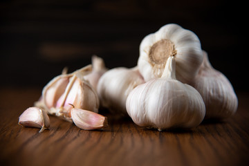 Garlic bulb on the wooden vintage background