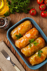 Traditional stuffed cabbage with minced meat and rice, served in a tomato sauce.