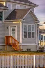 Home in Daybreak Utah with lawn and picket fence
