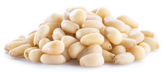 Pine nuts on the white background. Organic food.