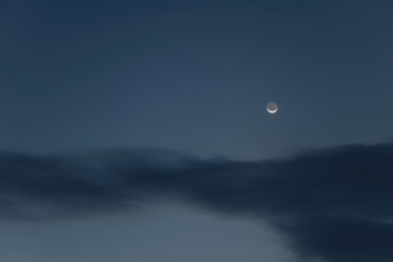 Huge full moon on the night sky.